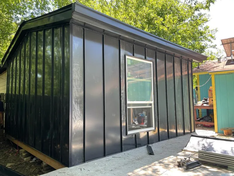 Black standing seam metal wall panels for Metal Roof Installation in Allen