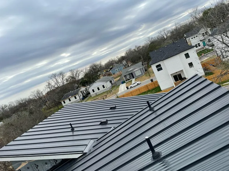 Standing seam metal roof panels with vents for Skylight Repair in Allen
